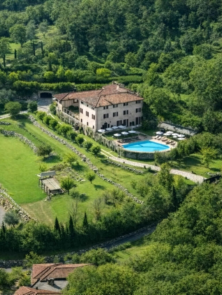 Historic Italian wedding venue surrounded by local landscape